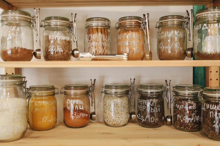 kitchen storage with spices in mason jars